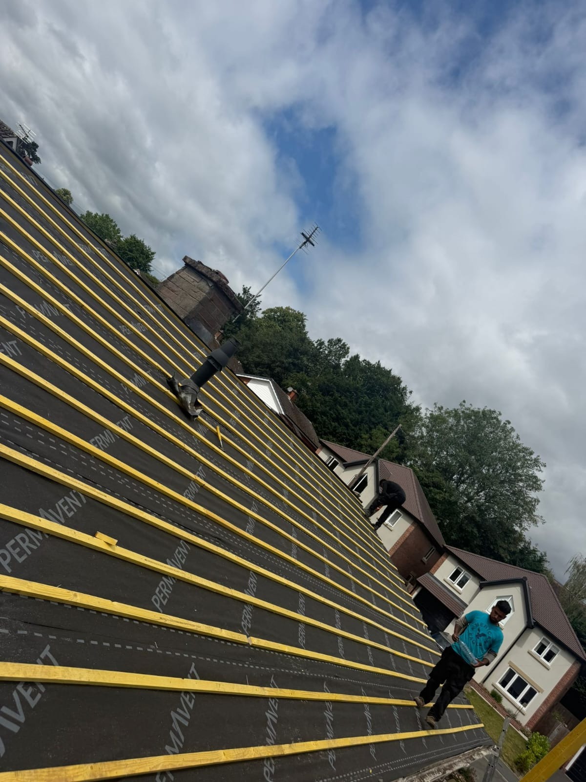 Roof battens and breathable membrane being installed during a full re-roof in Stoke-on-Trent