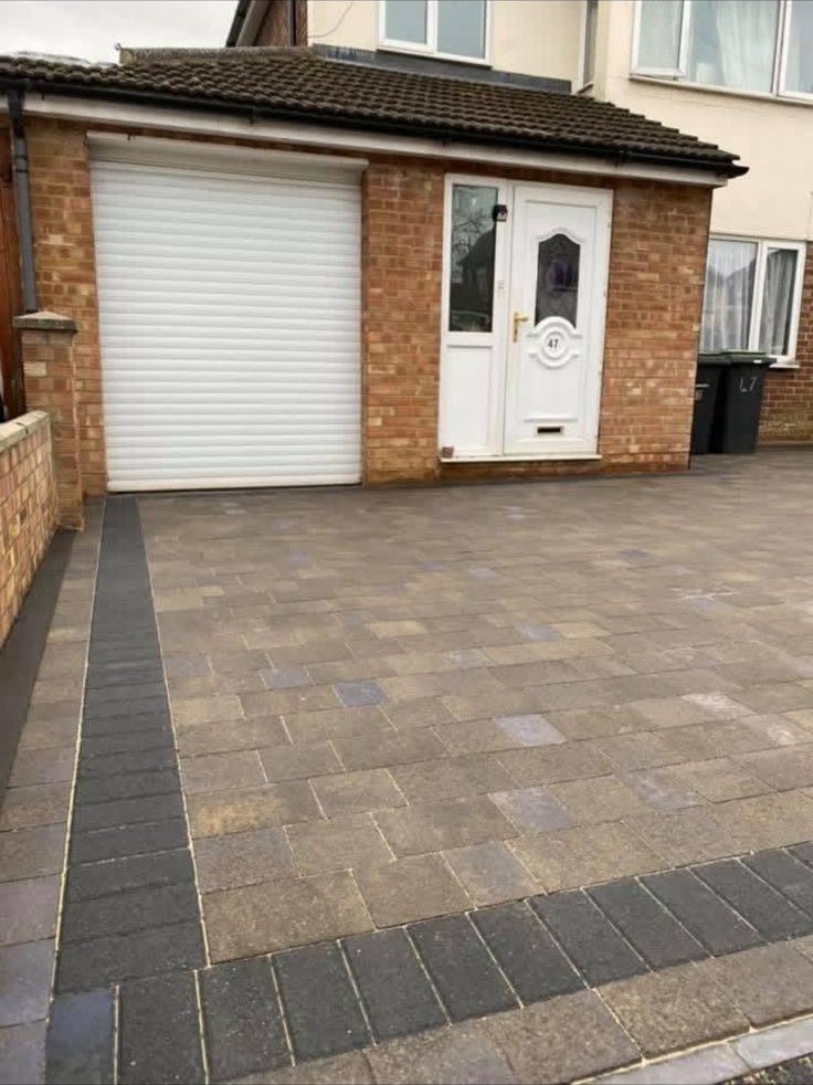 Two-tone block paving driveway with charcoal border on a Droitwich semi-detached home